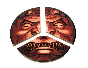 a triptych-style game token made of three pieces that come together to make a demonic face