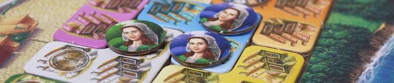 closeup of players' game pieces on the game board