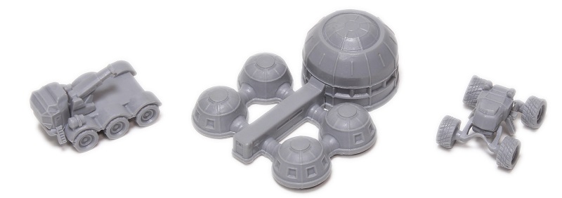plastic gray miniatures depicting Mars dwellings and vehicles