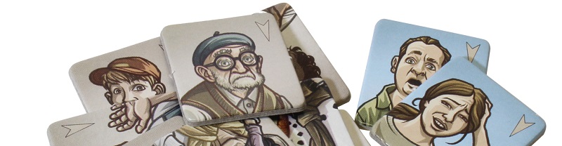 closeup of game tokens, depicting art of characters from the game 