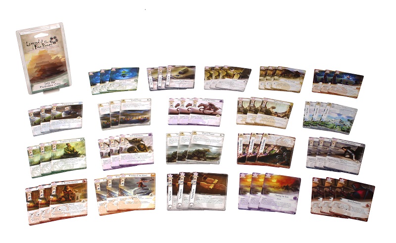 The twenty sets of three cards groups within the game, spread out next to the game's box on display