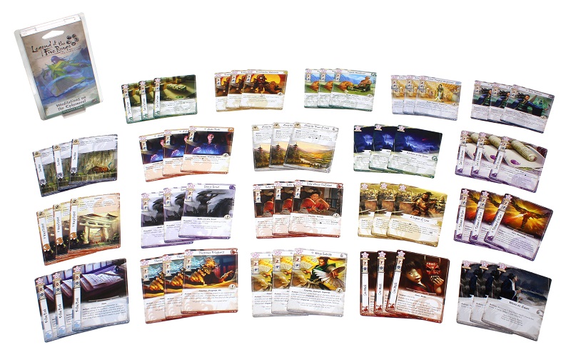 Closeup of twenty sets of three cards included within the game, next to the game's display pack