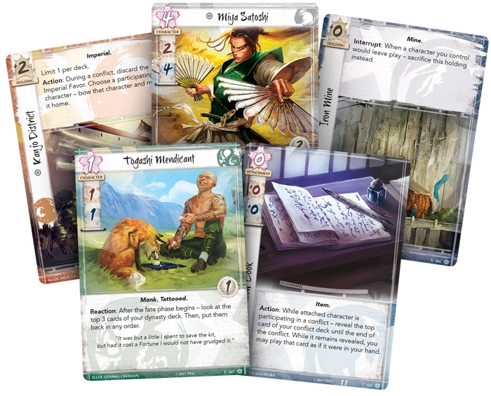 Closeup of five cards from the game, including two character cards, two landscape cards, and an item card