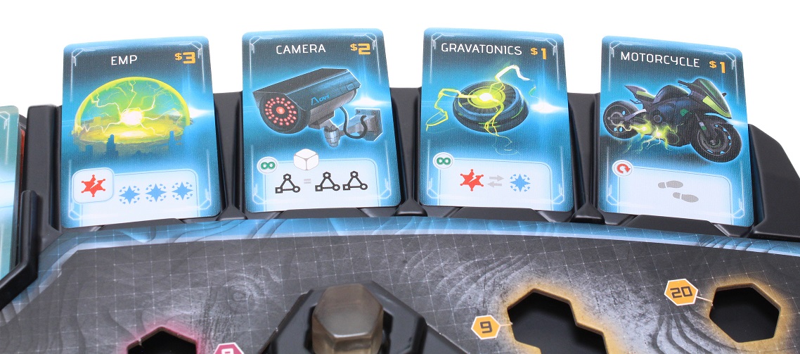 Close-up of game tray with item cards