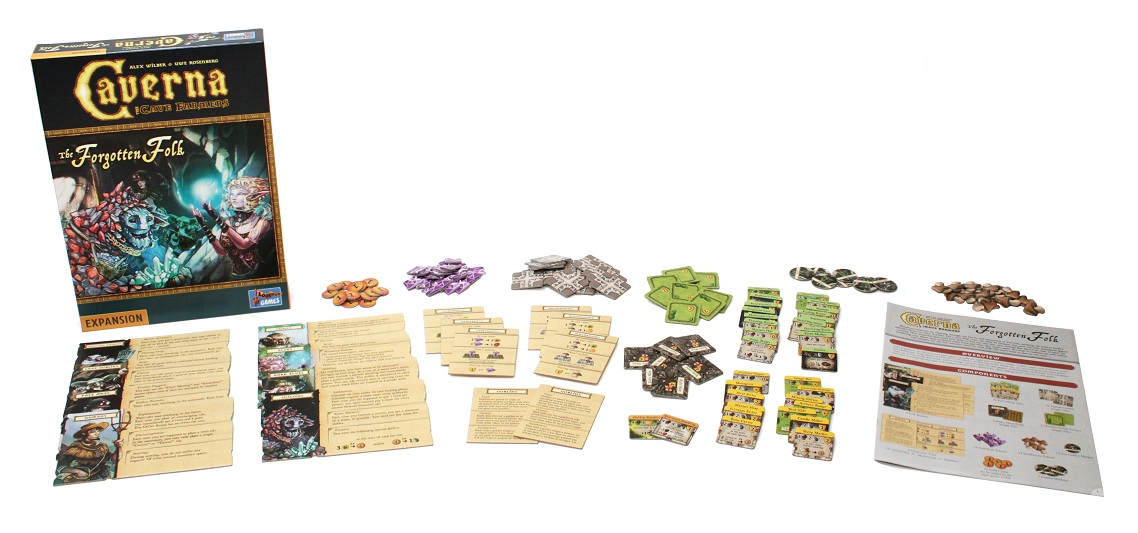 all game components laid out, including game box, rulebook, player boards, game pieces, cards and tokens