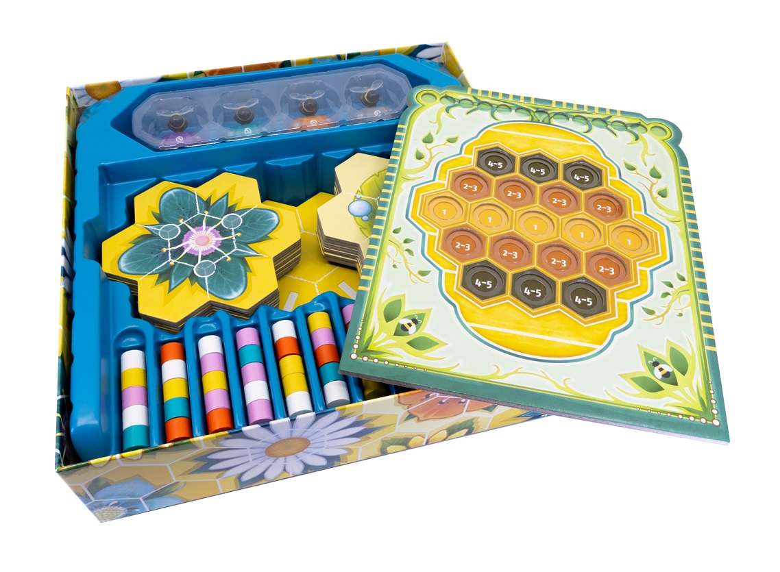 A spread of carboard game board tiles with images of flowers and leaves